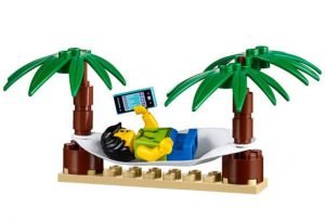 A LEGO figure relaxing in a hammock. Used under LEGO fair-play policy. inovex is in no way sponsored by Lego Group. For more information visit https://www.lego.com/en-us/legal/legal-notice/fair-play