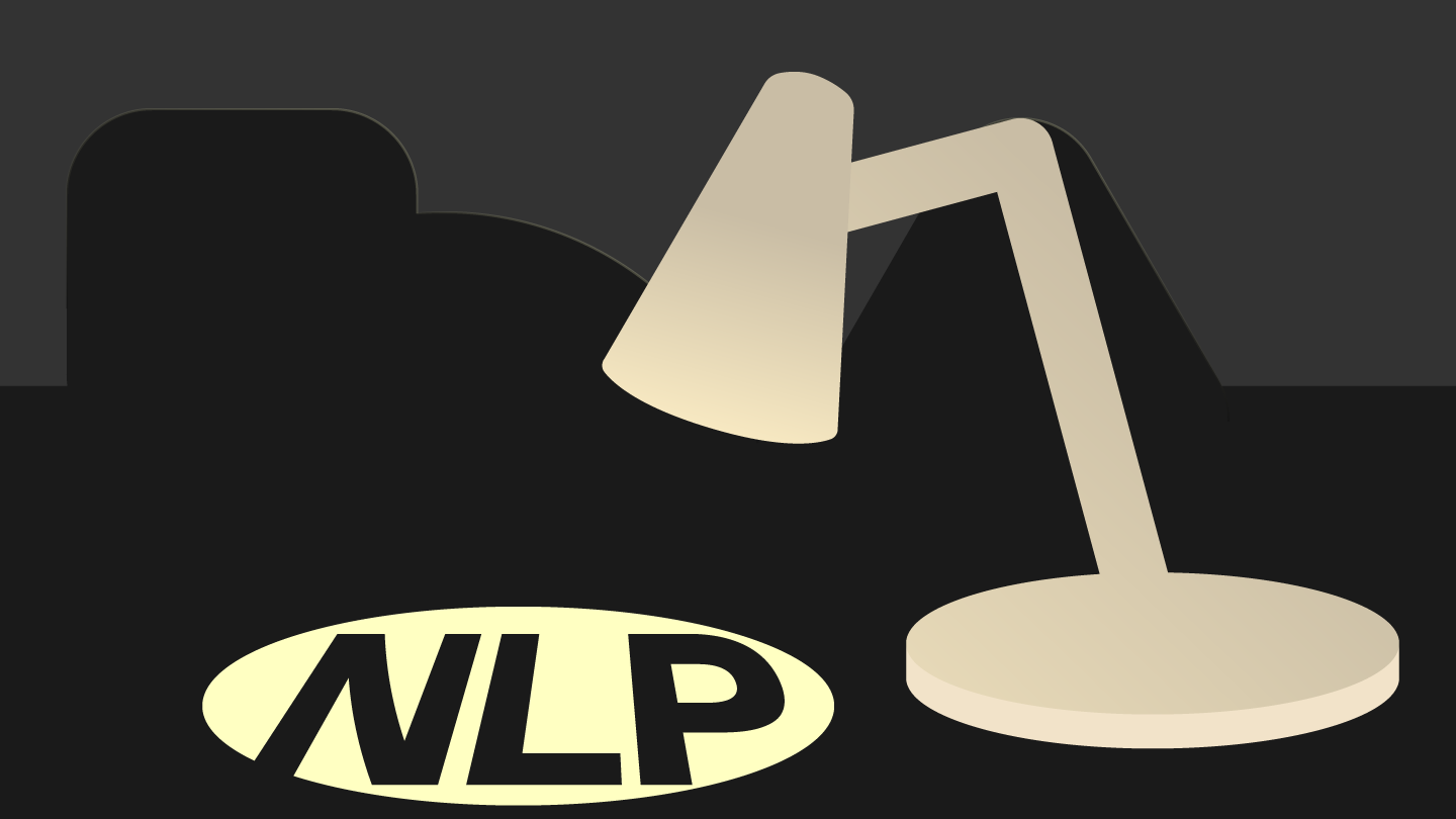 A lamp illuminating the letters NLP